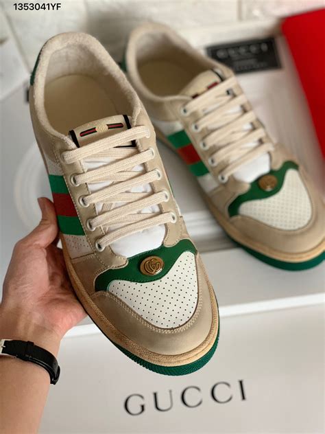 gold gucci sneakers men's|gucci women black sneakers.